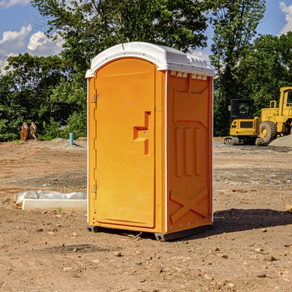 how often are the portable toilets cleaned and serviced during a rental period in Lane